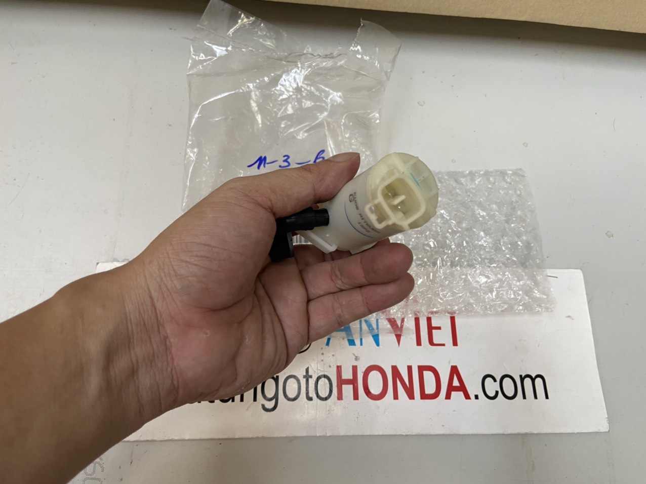 Mô tơ bơm nước rửa kính xe Honda JAZZ